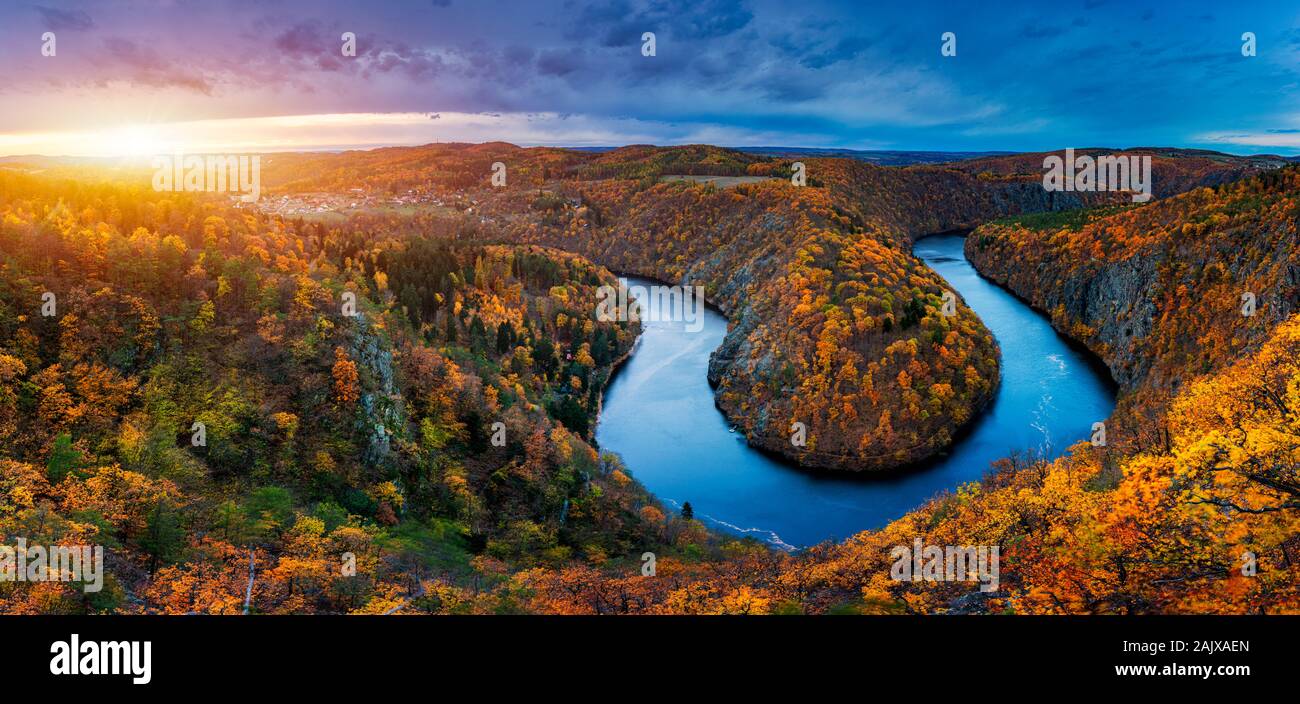 Beautiful Vyhlidka Maj, Lookout Maj, near Teletin, Czech Republic. Meander of the river Vltava surrounded by colorful autumn forest viewed from above. Stock Photo