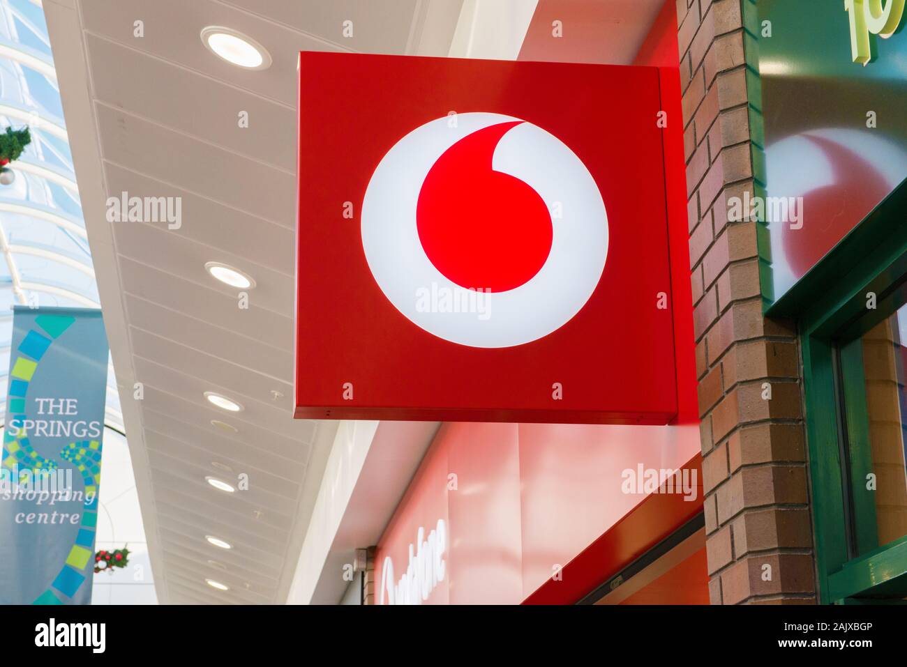 Vodaphone sign over mobile phone shop Spring Gardens, Buxton