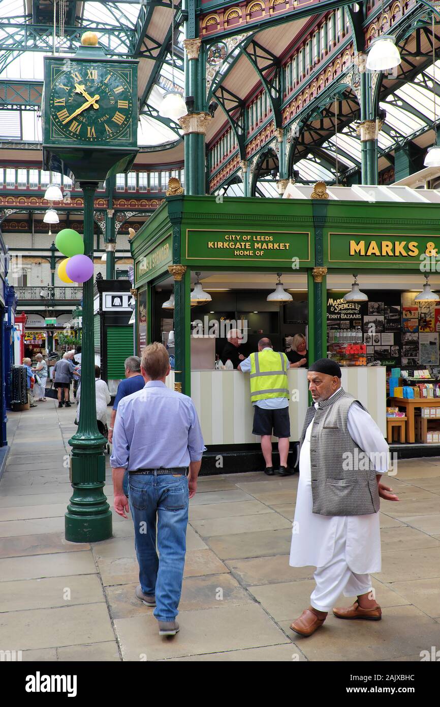 Leeds Kirkgate Market, The Centenary Clock and Marks & Spencer stall, Leeds, West Yorkshire, England, UK, Europe Stock Photo