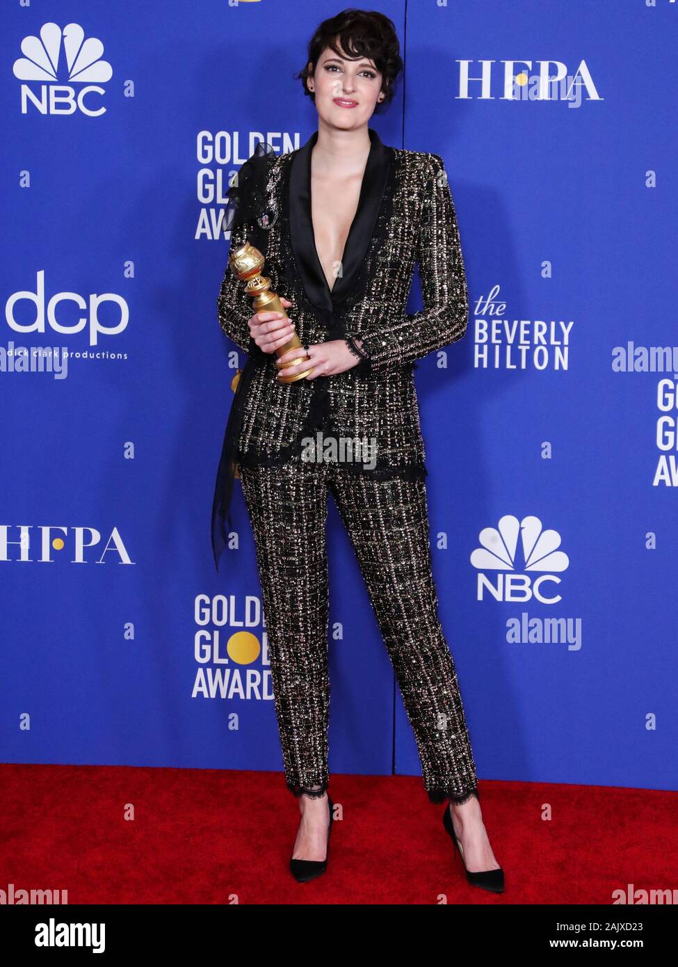 BEVERLY HILLS, LOS ANGELES, CALIFORNIA, USA - JANUARY 05: Actress Waller-Bridge wearing a Ralph Russo Couture suit, Christian Louboutin shoes, a Jimmy clutch, and Irene Neuwirth jewelry poses in