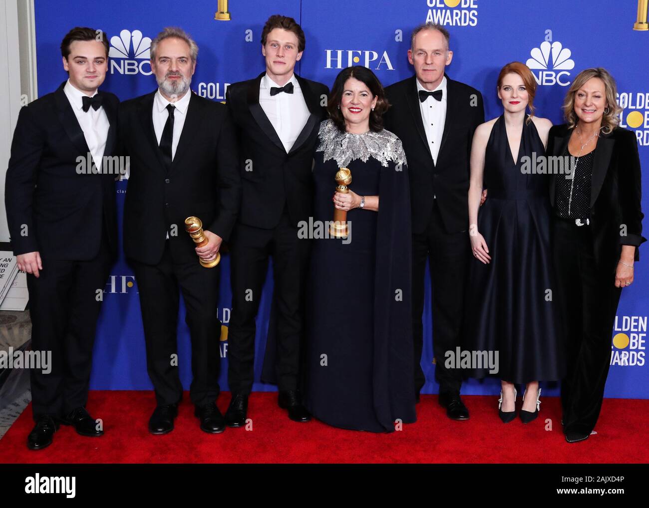 BEVERLY HILLS, LOS ANGELES, CALIFORNIA, USA - JANUARY 05: Dean-Charles Chapman, Sam Mendes, George MacKay, Pippa Harris, Callum McDougall, Krysty Wilson-Cairns and Jayne-Ann Tenggre pose in the press room at the 77th Annual Golden Globe Awards held at The Beverly Hilton Hotel on January 5, 2020 in Beverly Hills, Los Angeles, California, United States. (Photo by Xavier Collin/Image Press Agency) Stock Photo