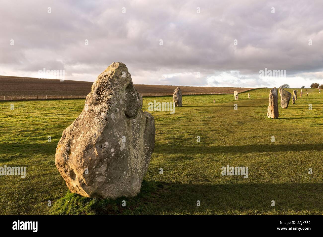 The West Kennett (or Kennet) Avenue at Avebury, Wiltshire, UK, part of a vast Neolithic henge monument built around 3000 BC. Stock Photo