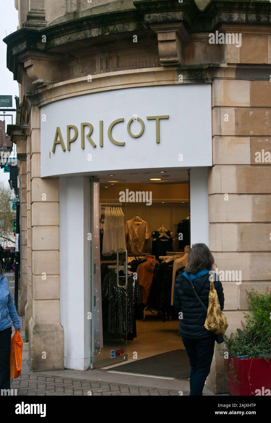 Front Door Entrance Of A Apricot Clothes Shop Store Stock Photo