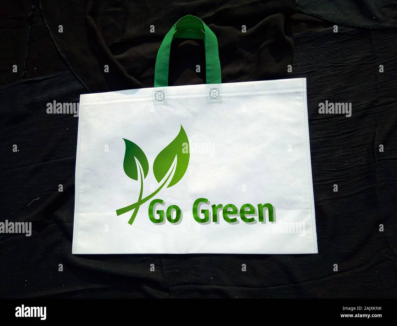 Reusable Plastic Carrier Bag - Lets Save it Together Print