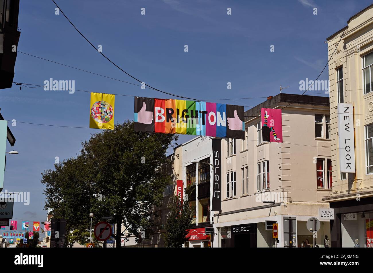 Banner hung between two buildings hires stock photography and images