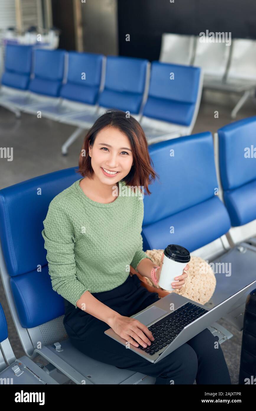 Beautiful business woman waiting airport hi-res stock photography and ...