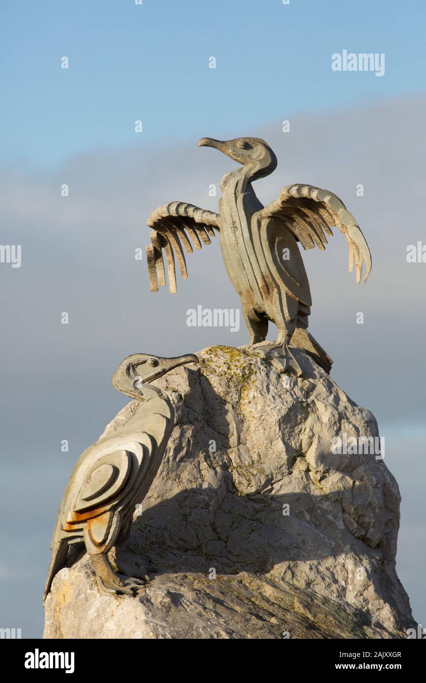 Cormorant sculptures photographed on Christmas day 2019 along the seafront of Morecambe in Lancashire England UK GB. Stock Photo