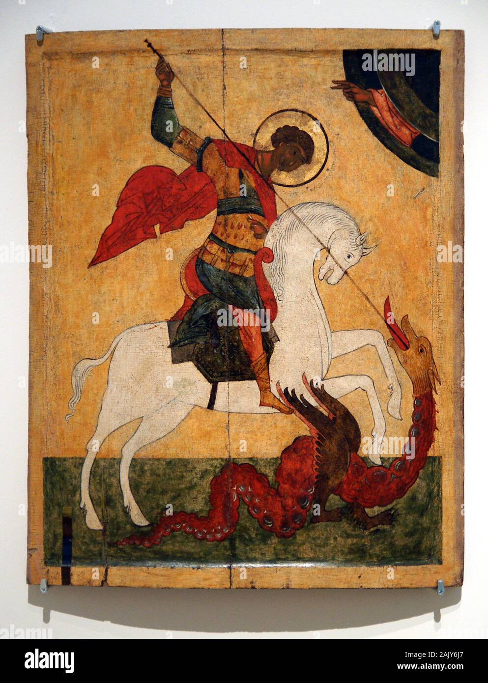 Icon painting. The miracle of St. George and the Dragon. (1500-1550), Northen Russia. Limewood, tempera and gilding. Hermitage Museum. Stock Photo