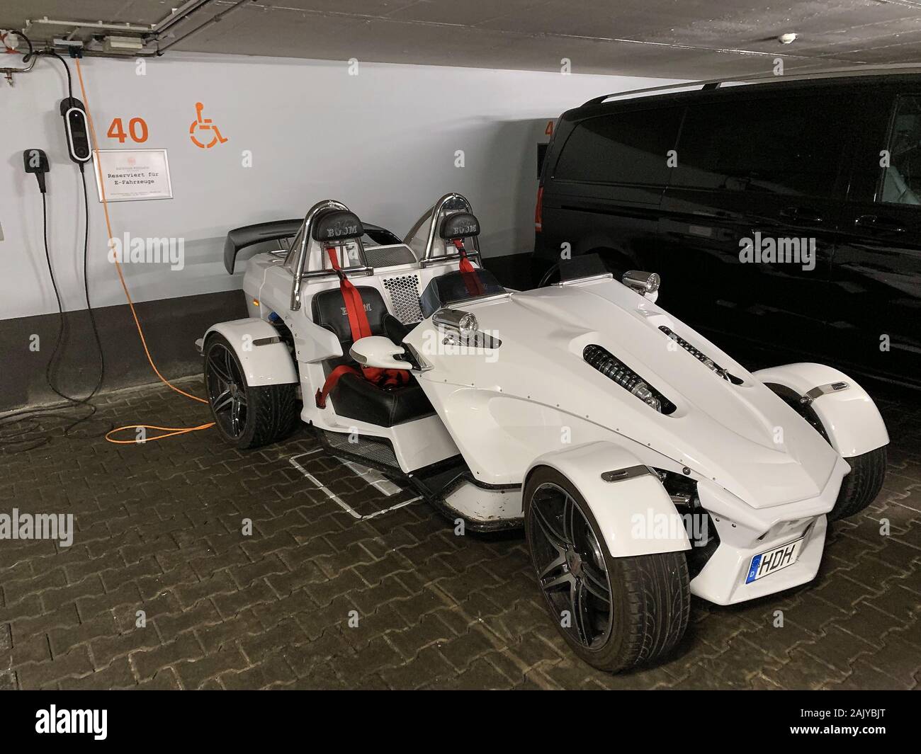 Ecar at a charging station in Hotel Bachmair in Rottach-Egern, Tegernsee, Germany, August 06, 2019.  © Peter Schatz / Alamy Stock Photos Stock Photo