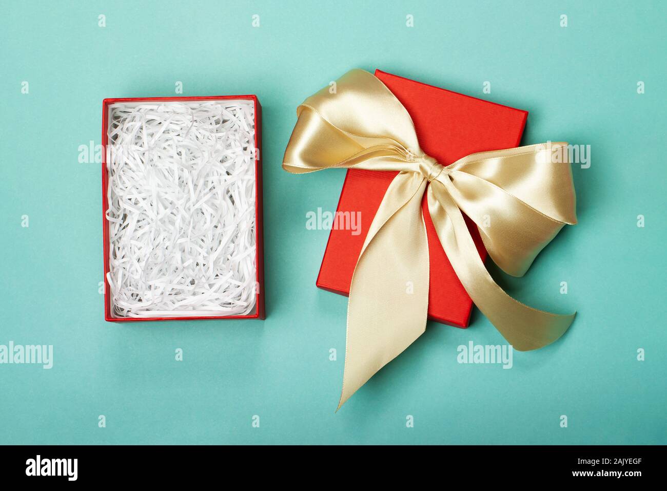 An opened gift box with a bow in which you can easily put any item. Trendy  colors. Merry Christmas, St. Valentine's Day, Happy Birthday and other  holidays concept Stock Photo - Alamy