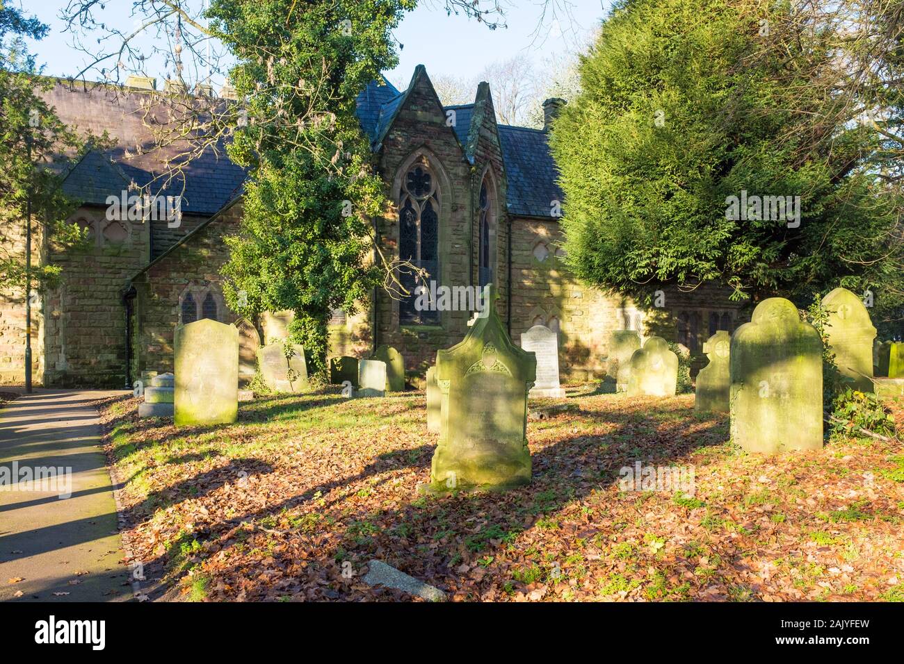 Graveyard at St Peter's Church in Harborne, Birmingham in winter sunshine Stock Photo