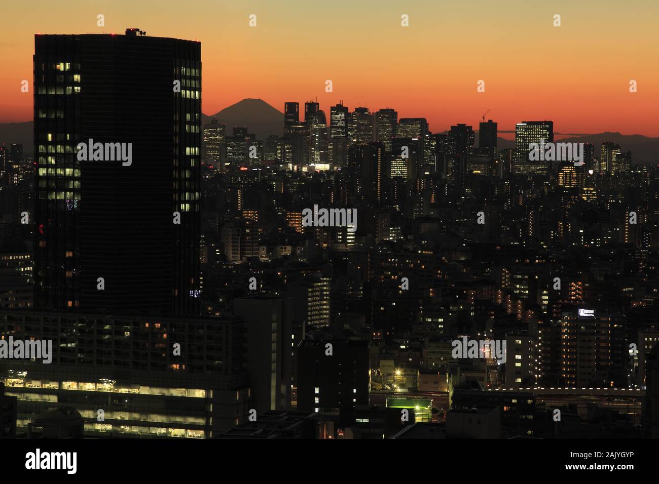 Tokyo at sunset and mount fuji Stock Photo