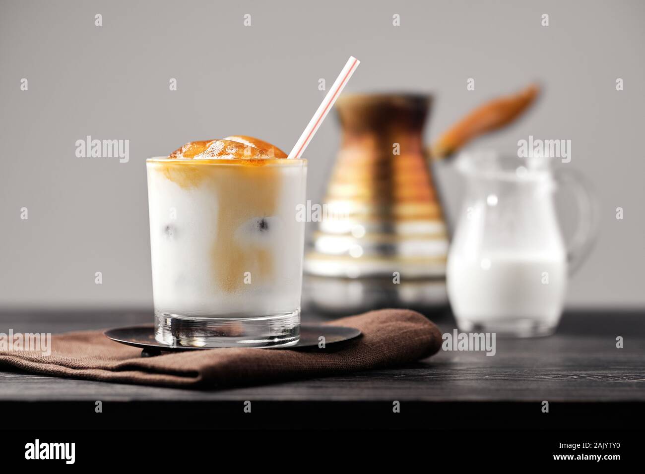 Iced latte with frozen coffee cubes and sweet cream Stock Photo