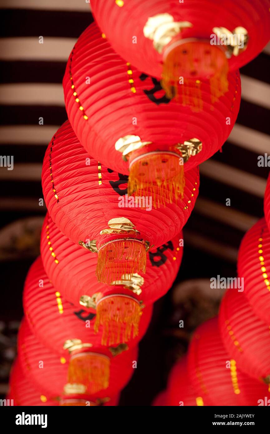 Chinese red temple lanterns in a row Stock Photo