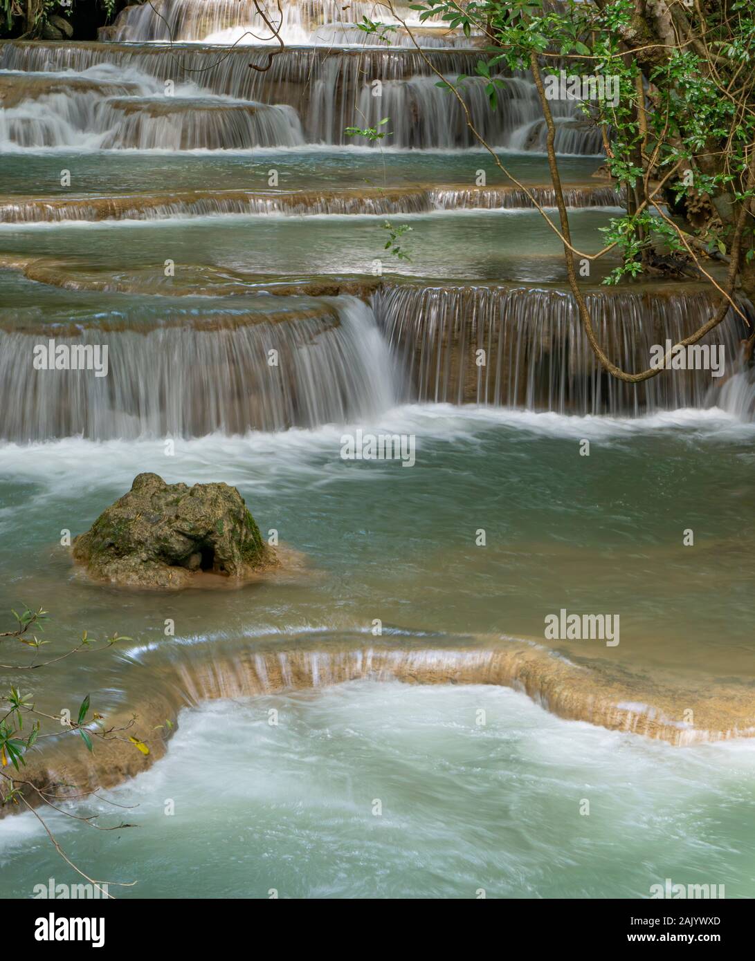The clean waterfall there is an emerald green colour caused by ...