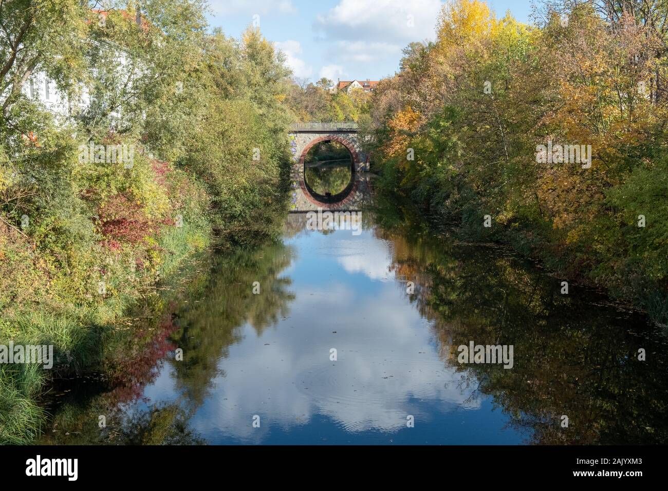 a bridge on the Karl-heine-canal in Leipzig in autumn Stock Photo