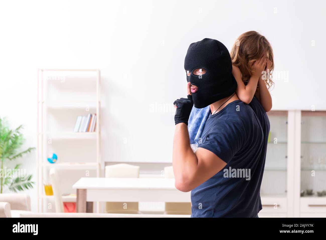 The child trafficking and abuse concept with small girl Stock Photo - Alamy
