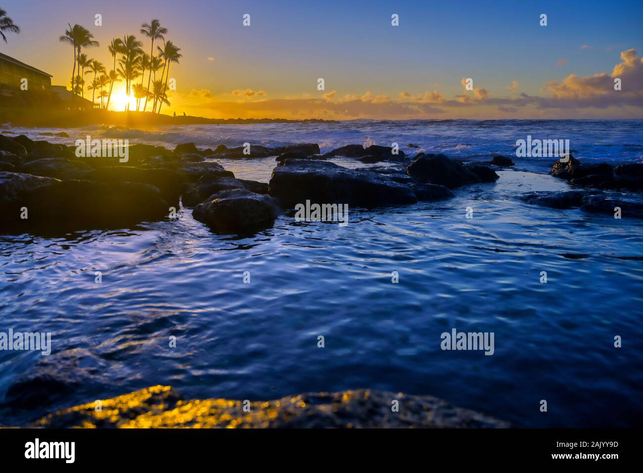 The sunrise over the beach in Kauai, Hawaii Stock Photo - Alamy
