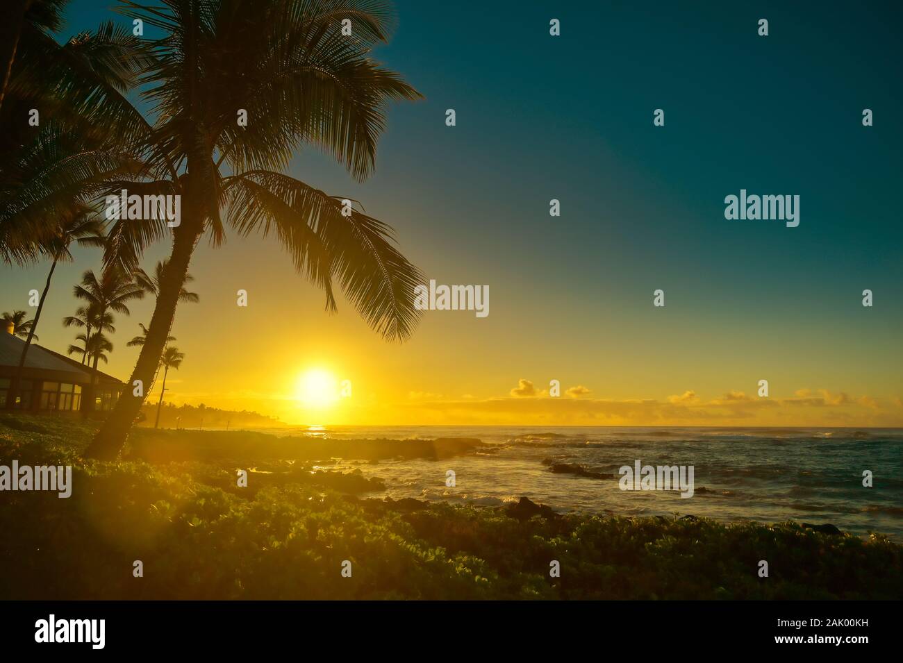 The sunrise over the beach in Kauai, Hawaii Stock Photo - Alamy