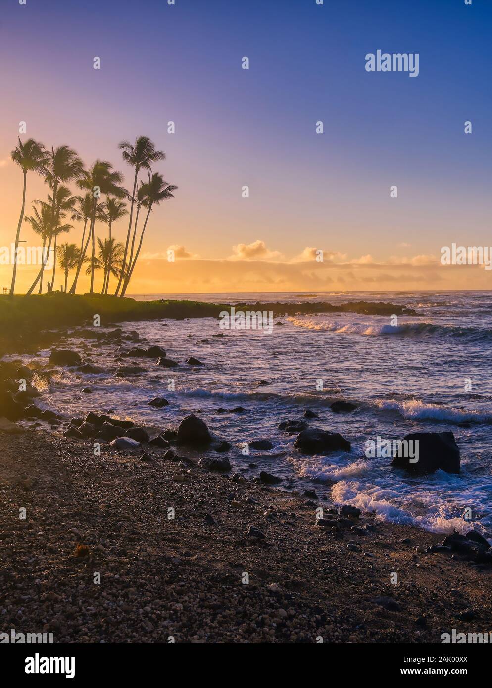 The sunrise over the beach in Kauai, Hawaii Stock Photo - Alamy