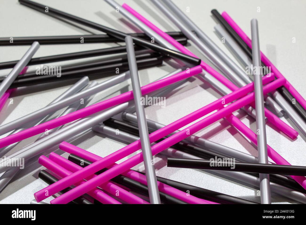 Wild drinking straws on the table, looks like a Mikado game Stock Photo