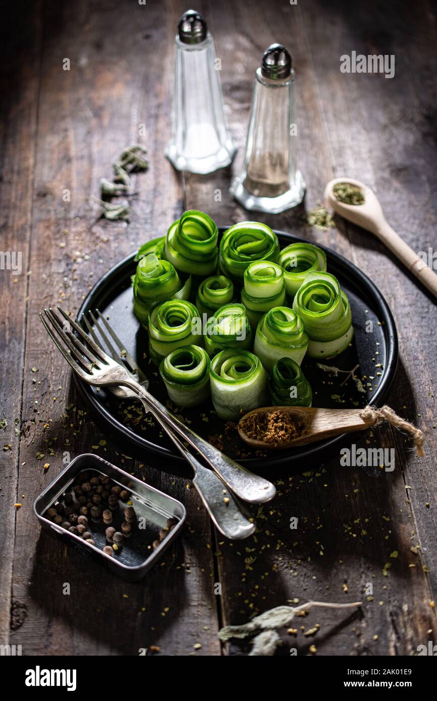 Cucumber salad.Healthy food.Crunchy snack.Old boards.Low fat breakfast Stock Photo