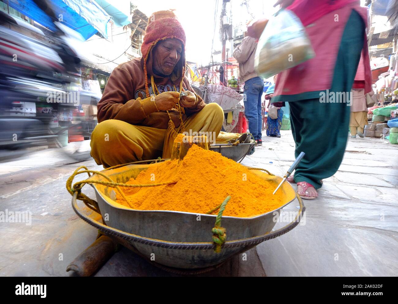 Turmeric seller on the streets of Kathmandu,Nepal Stock Photo