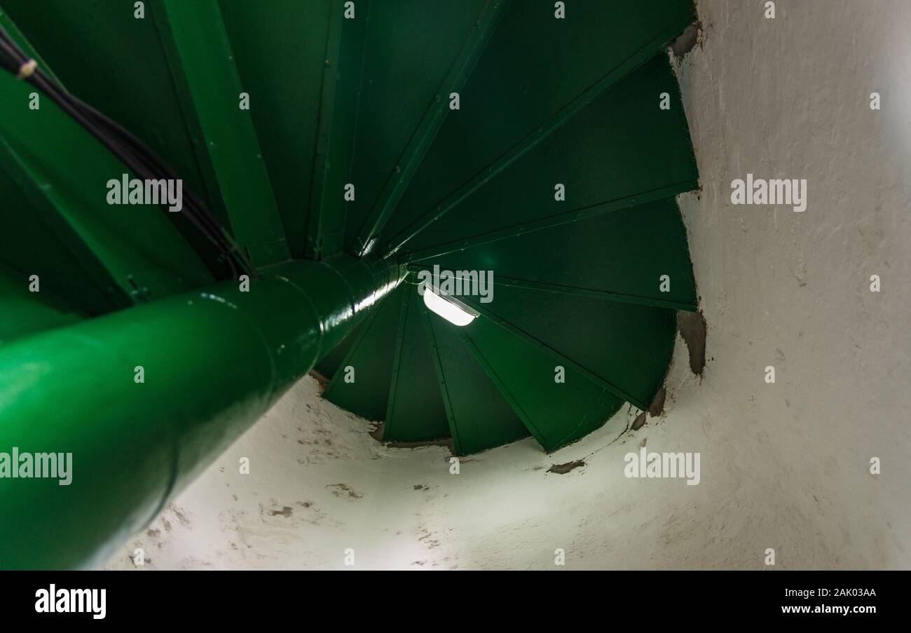Spiral winding stairs staircase in an old tower building. Stock Photo