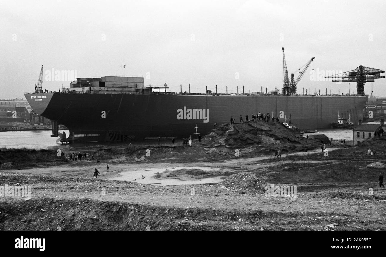 Spectators watch the launch of VLCC Esso Hibernia from the Wallsend shipyard of Swan Hunter on 6
