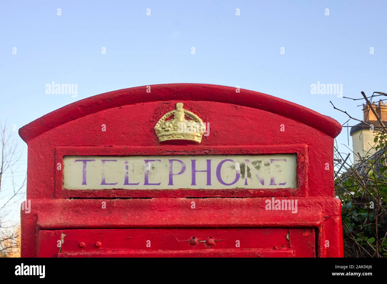 Red K6 phonebox in Bride village, Isle of Man showing detail of royal crown at the top Stock Photo