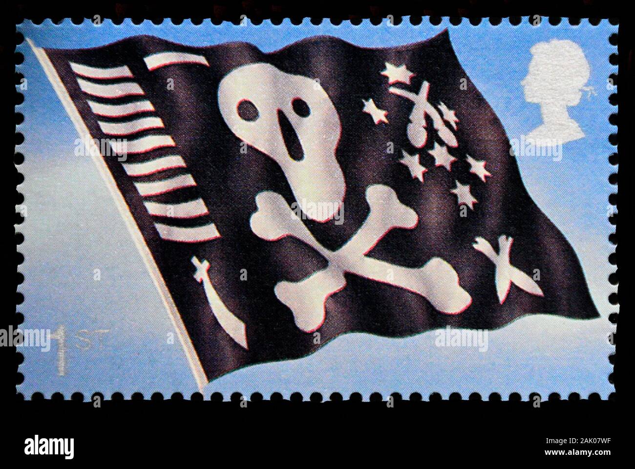 Postage stamp. Great Britain. Queen Elizabeth II. Centenary of Royal Navy Submarine Service. Jolly Roger Flag. 1st. class. 2001. Stock Photo
