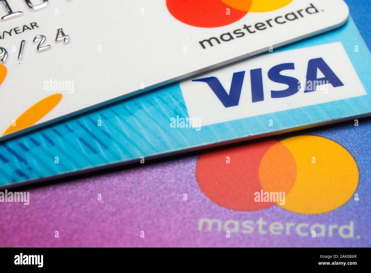 In this photo illustration a Visa credit card and Mastercard debit