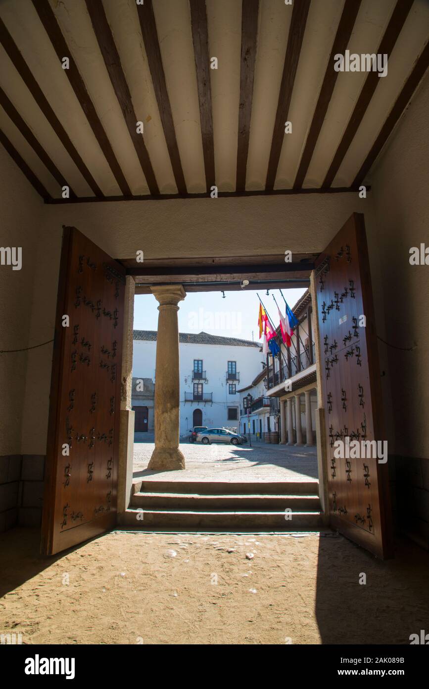 Plaza Mayor from a passage. Puebla de Montalban, Toledo province, Castilla La Mancha, Spain. Stock Photo
