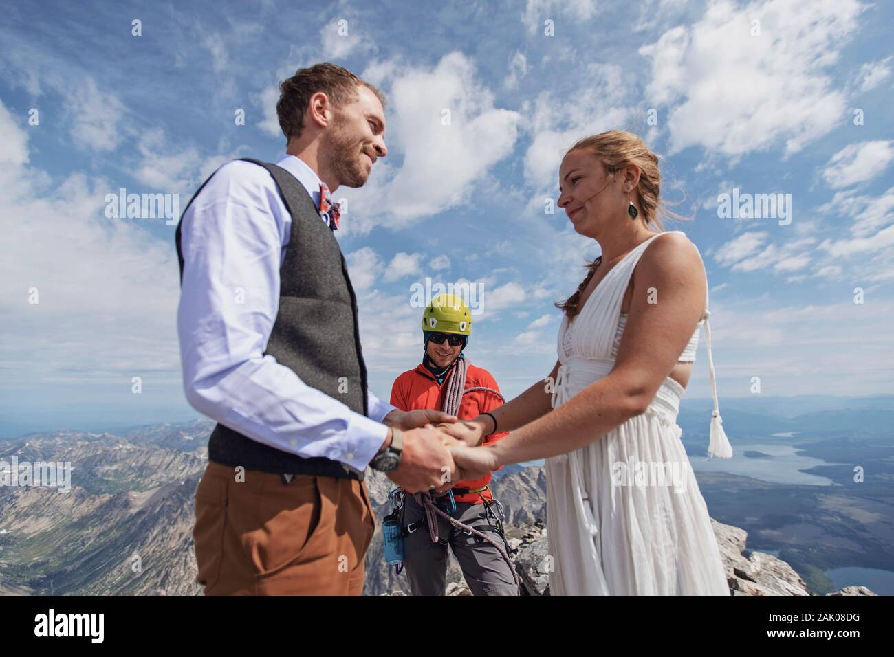 A young couple gets married on the top of a mountain in Wyoming Stock Photo