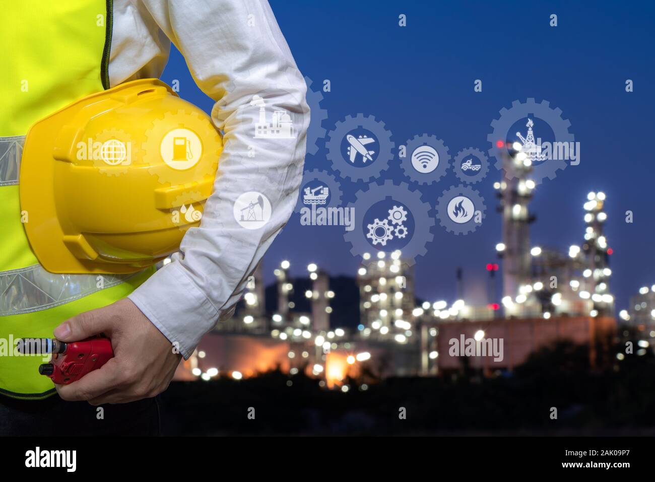 Engineer holding walkie talkie are working at refinery plant with icon connecting networking, Concept image Stock Photo