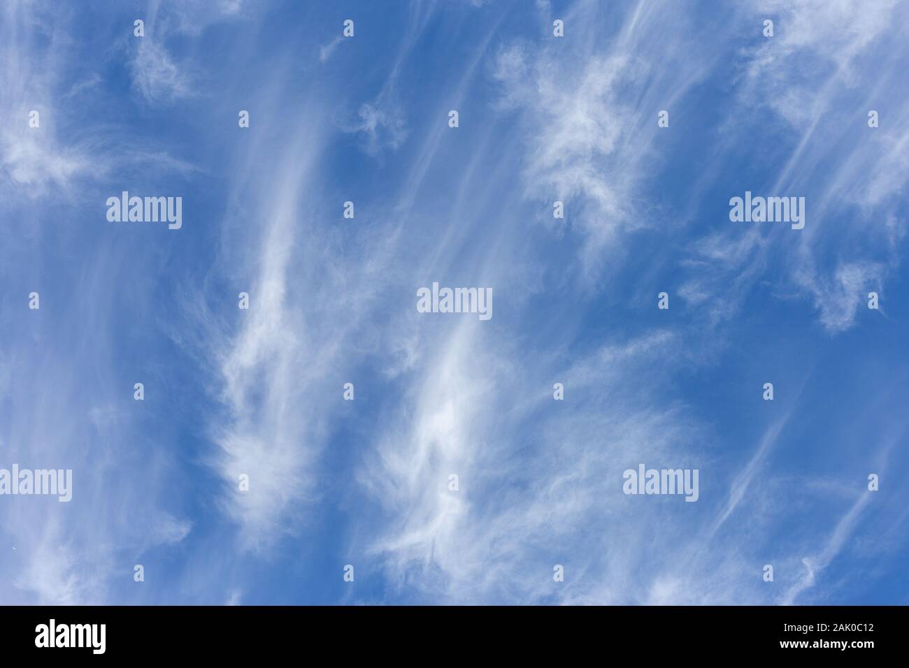 Blurred white clouds on the sky background. Stock Photo