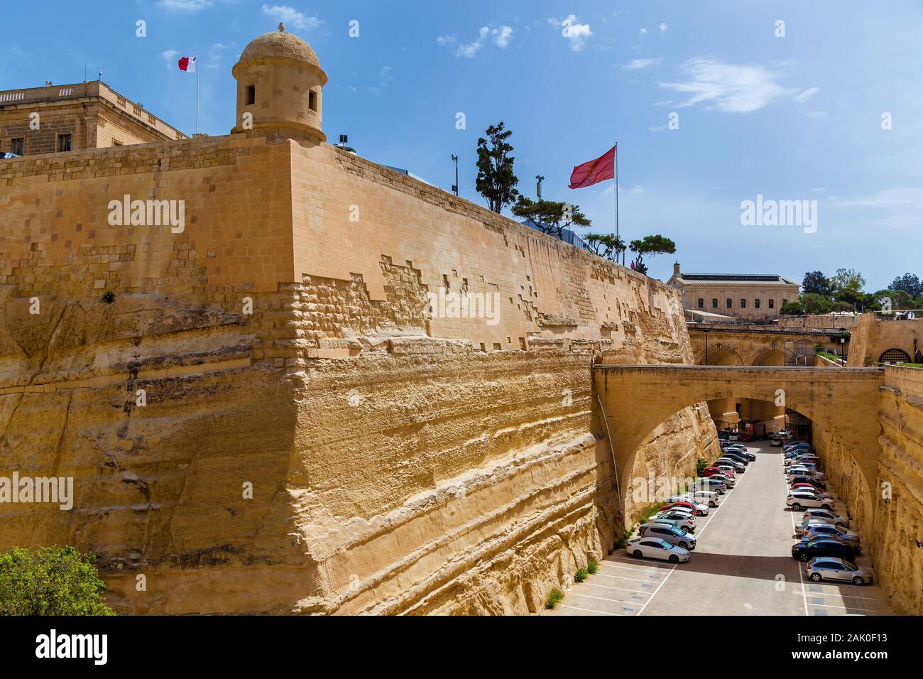 An amazing view of the medieval stone fortress with a beautiful green planting in Malta. Stock Photo