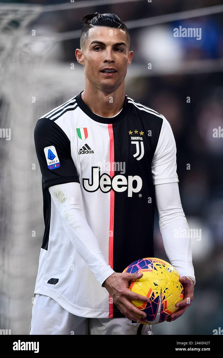 Turin, Italy - 06 January, 2020: Cristiano Ronaldo of Juventus FC holds the  ball during the Serie A football match between Juventus FC and Cagliari  Calcio. Juventus FC won 4-0 over Cagliari