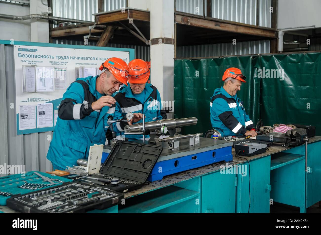 Technicians working in factory Stock Photo