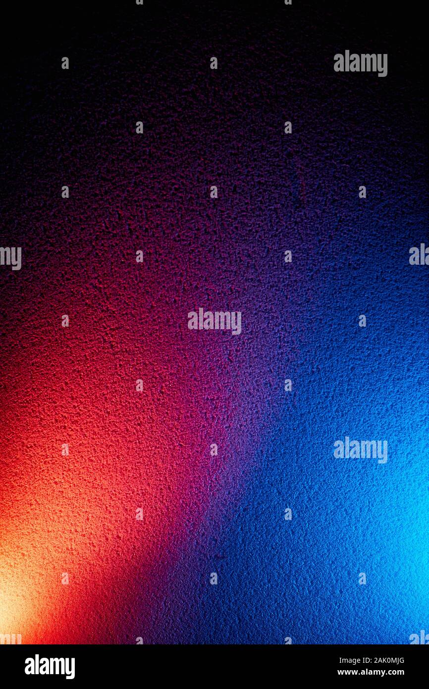 Red and blue gradient on black background Stock Photo