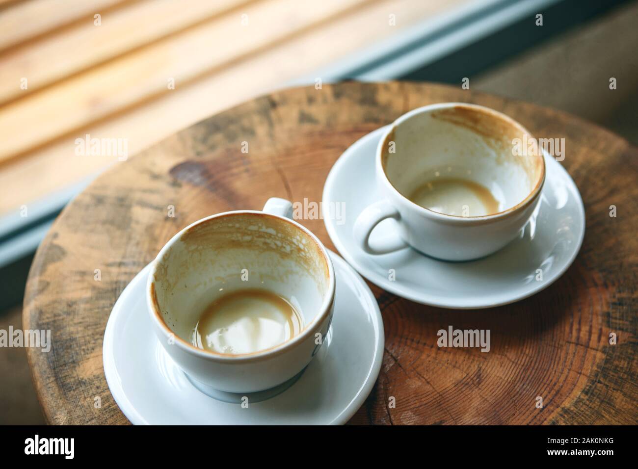 Two empty coffee cups finished beverage hi-res stock photography and images  - Alamy