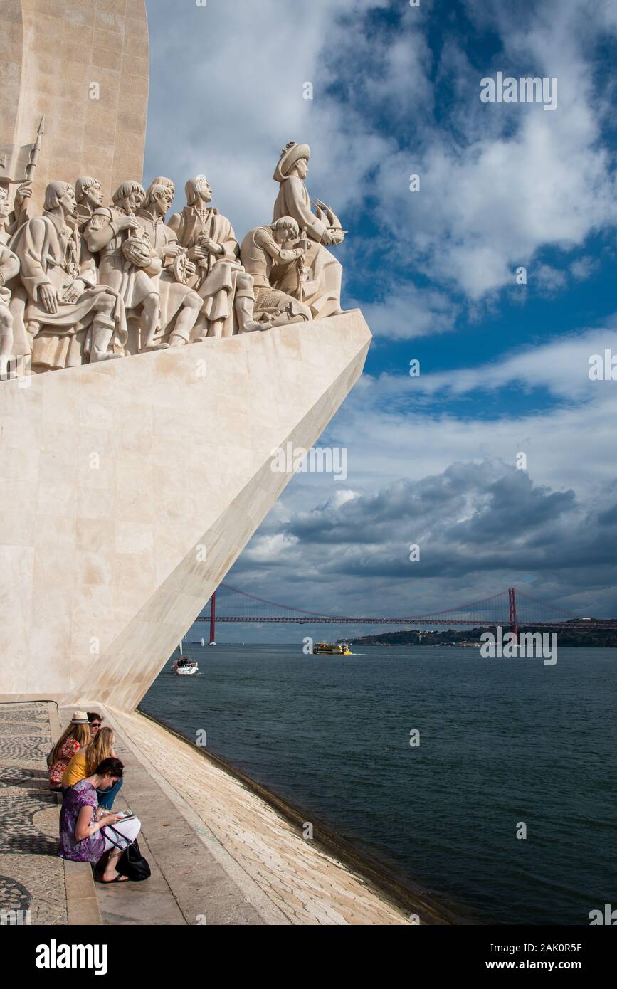 People sitting at  Padrao dos Descobrimentos Monument to the Discoveries. Lisbon Portugal Stock Photo