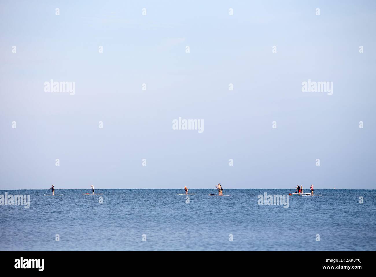 Annual SUP paddle board sporting event in Naples, Florida from the Pier to the City Dock. Stock Photo