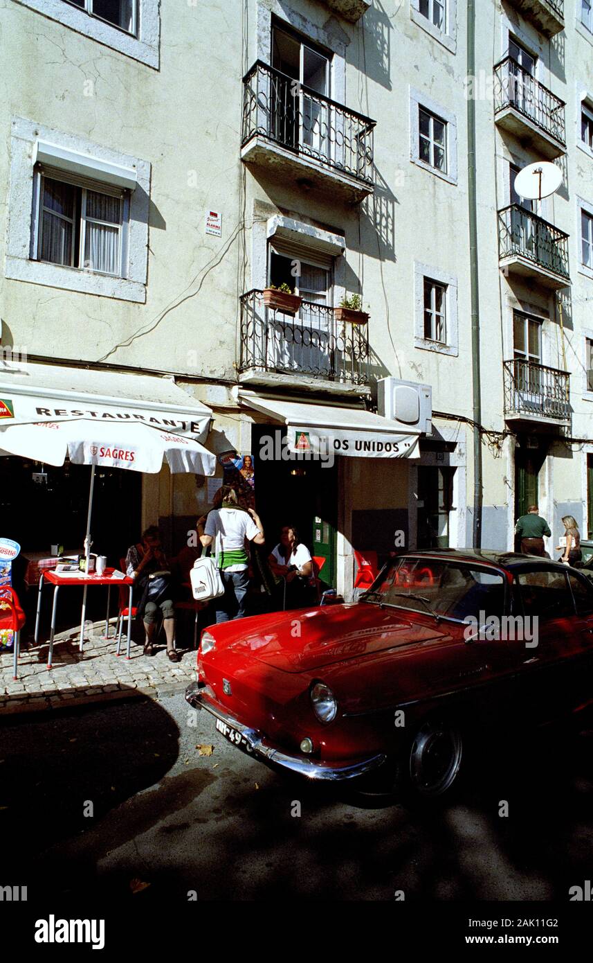 LISBOA PORTUGAL SMALL RESTAURANT PLACE AND A RENAULT FLORIDE PARKED IN FRONT - LISBOA VISIT - RENAULT CLASSIC CAR - COLOR SILVER FILM © Frédéric BEAUMONT Stock Photo