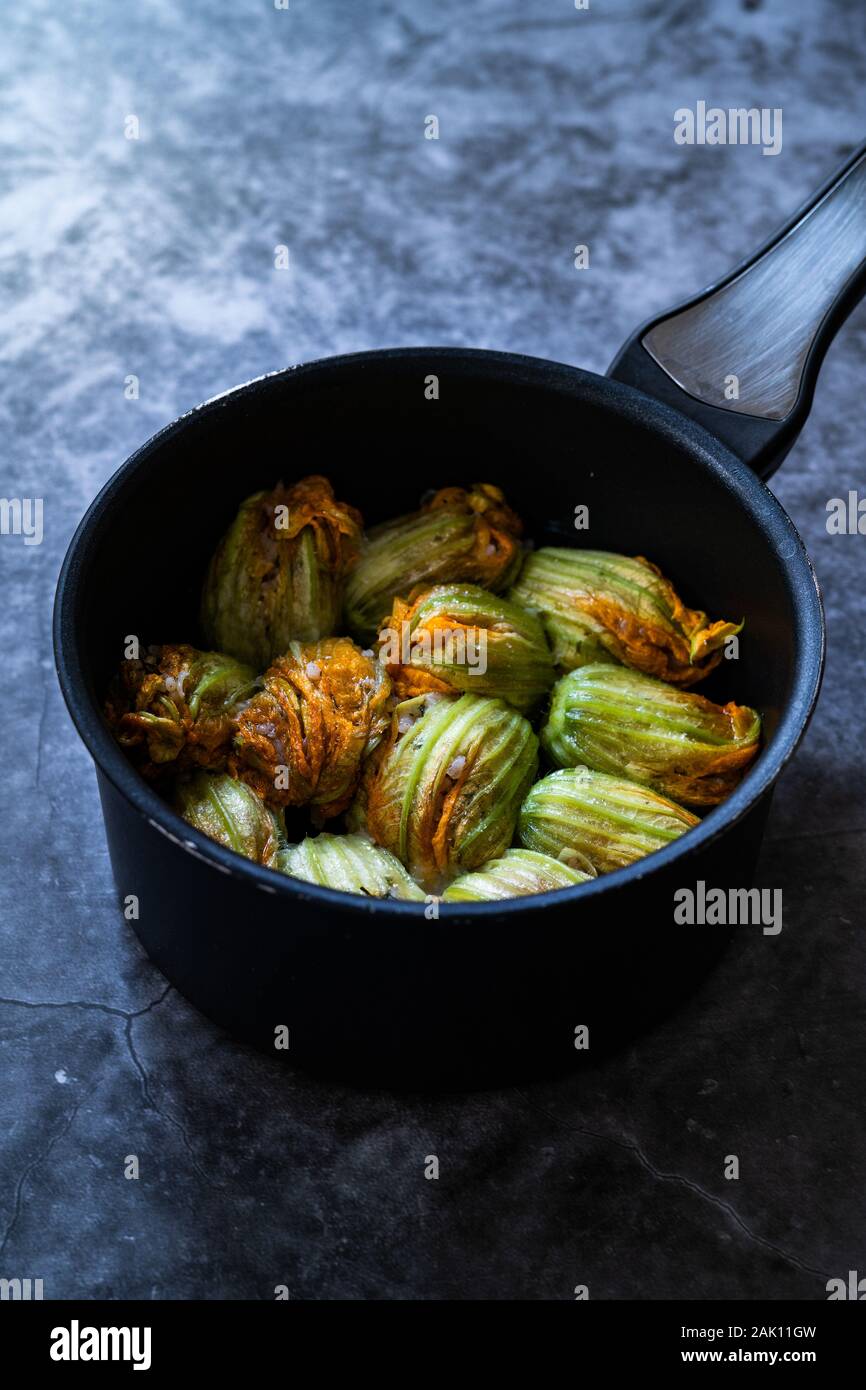 Zucchini Flowers Stuffed with Rice Pilaf for Dolma / Turkish Food in