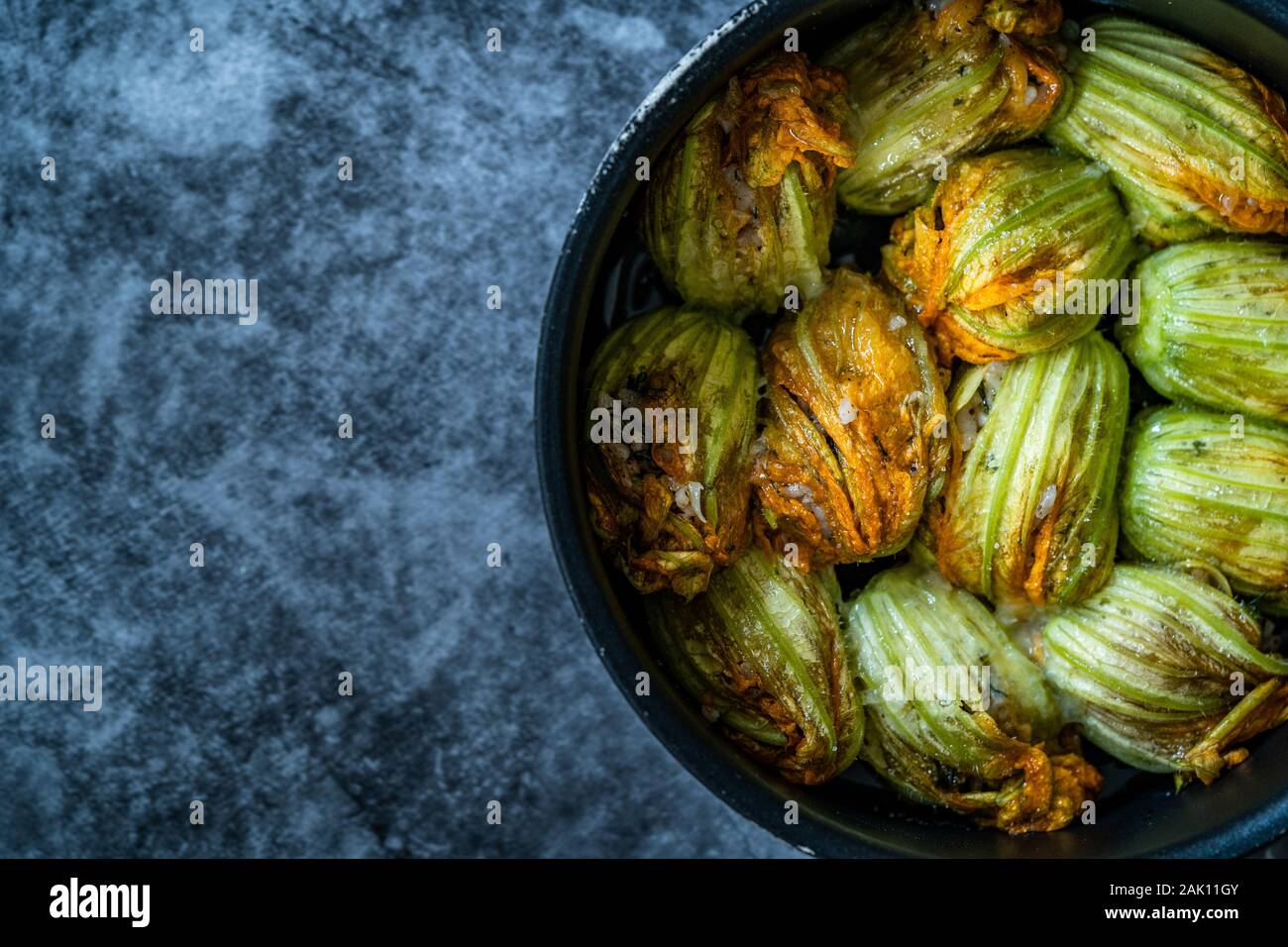 Zucchini Flowers Stuffed with Rice Pilaf for Dolma / Turkish Food in