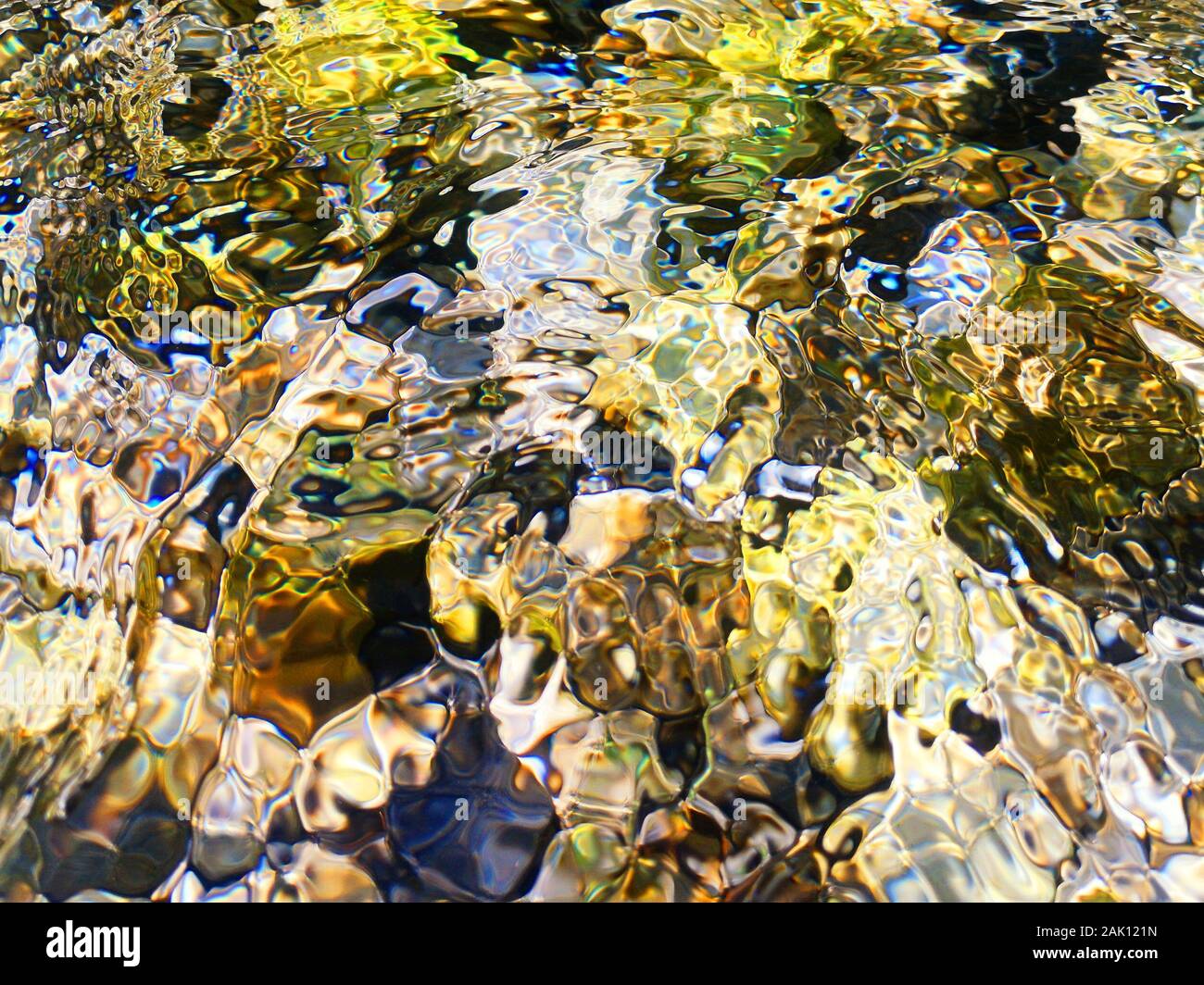 Multi-colored river stones.Background of colored sea stones close-up. Stock Photo