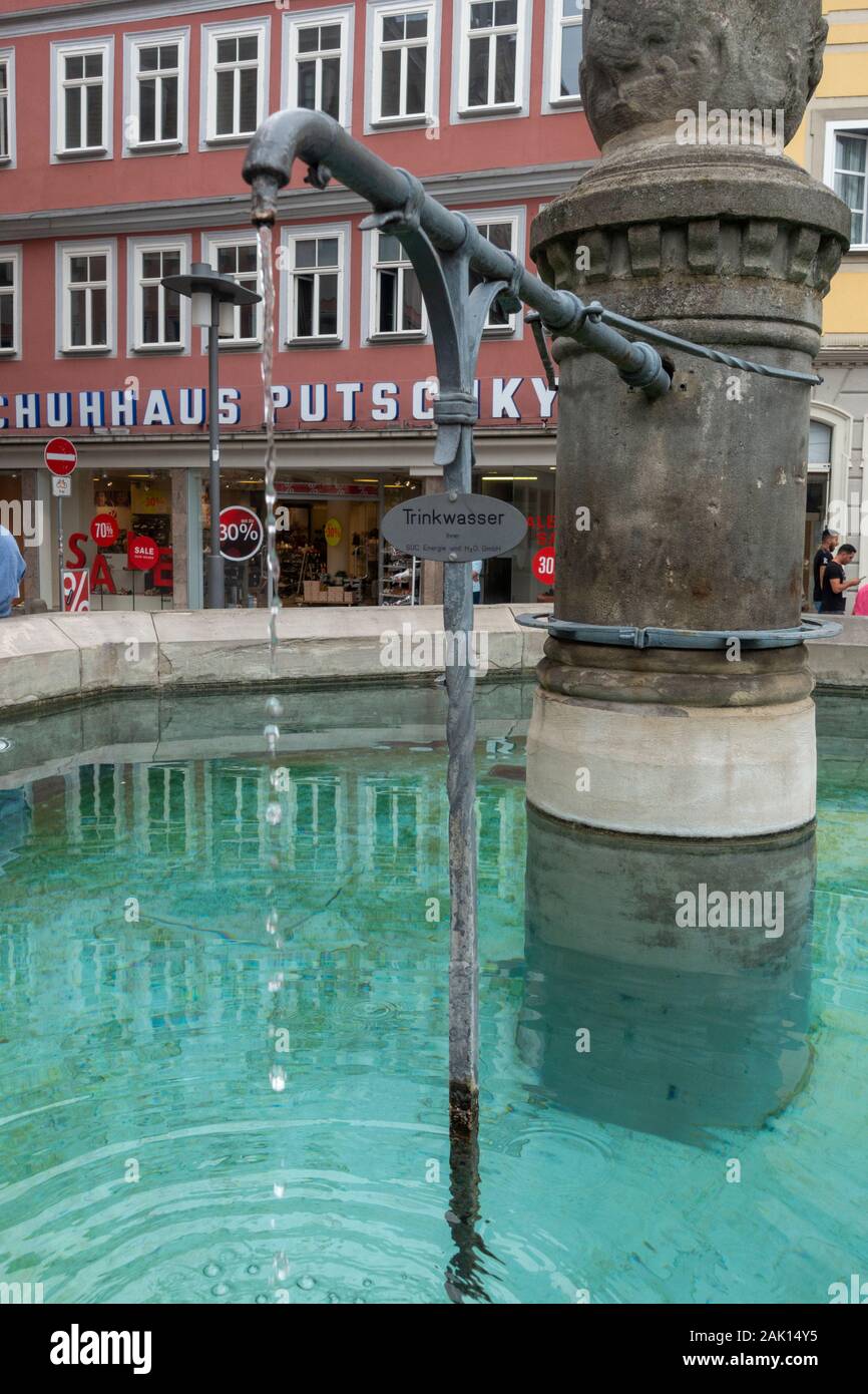 An ornate drinking fountain (trinkwasser) in Coburg, Bavaria, Germany. Stock Photo