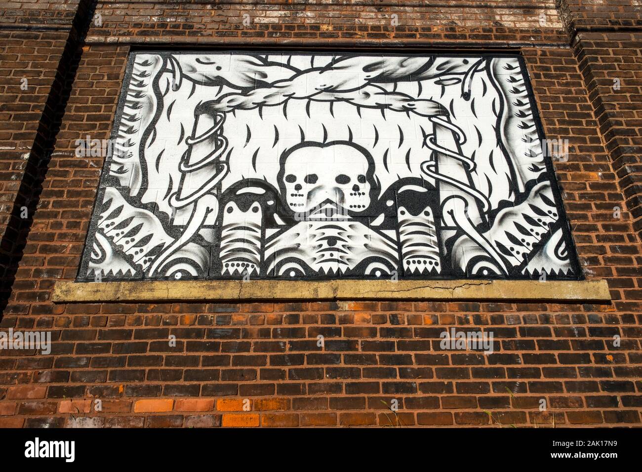 Mural with skulls depicts an ominous vision of industry in Detroit, Michigan Stock Photo