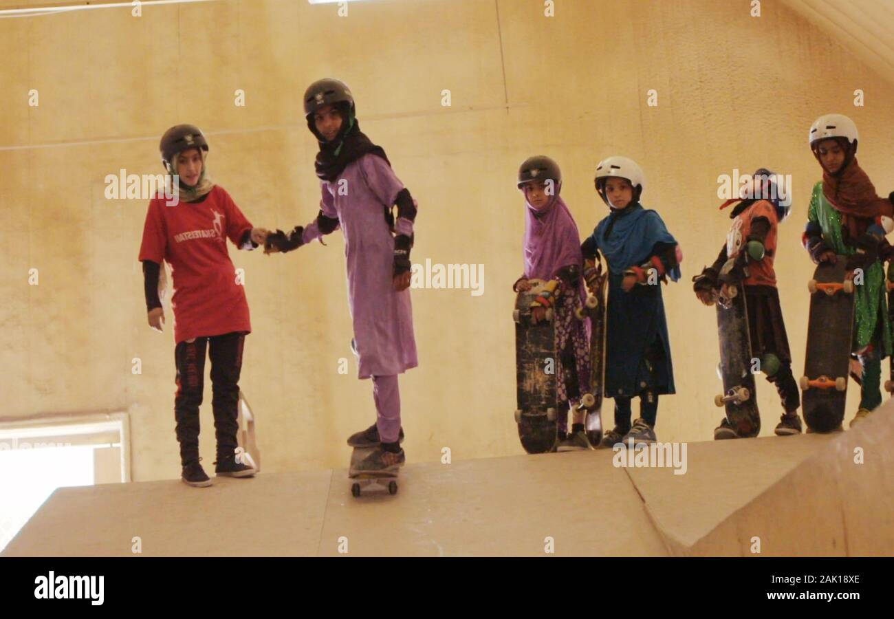 LEARNING TO SKATEBOARD IN A WARZONE (IF YOU RE A GIRL), students at  Skateistan, a school for girls in Kabul, Afghanistan where the traditional  classwork is supplemented with lessons in skateboarding, 2019. ©